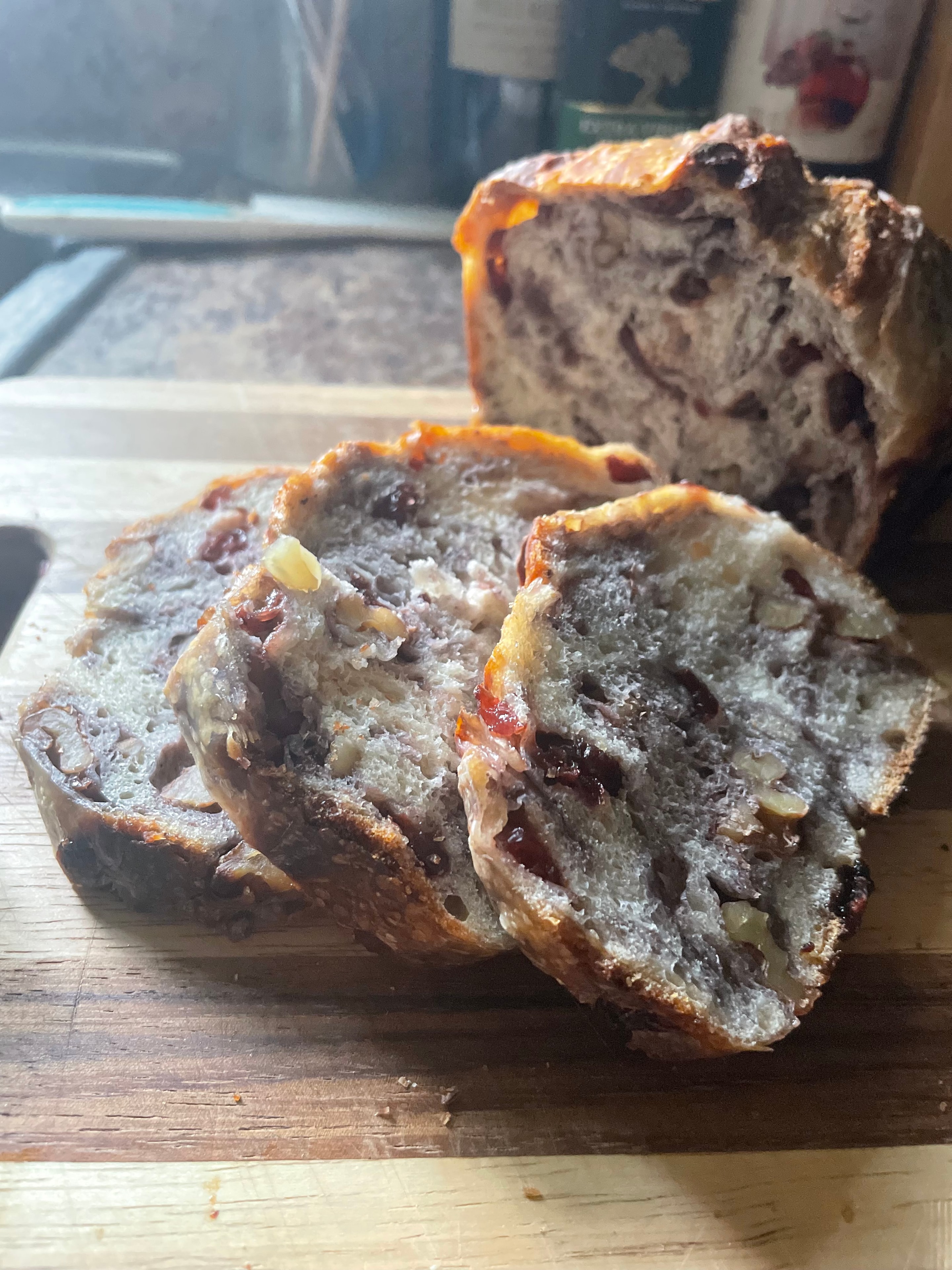 Sliced artisan bread showing open crumb